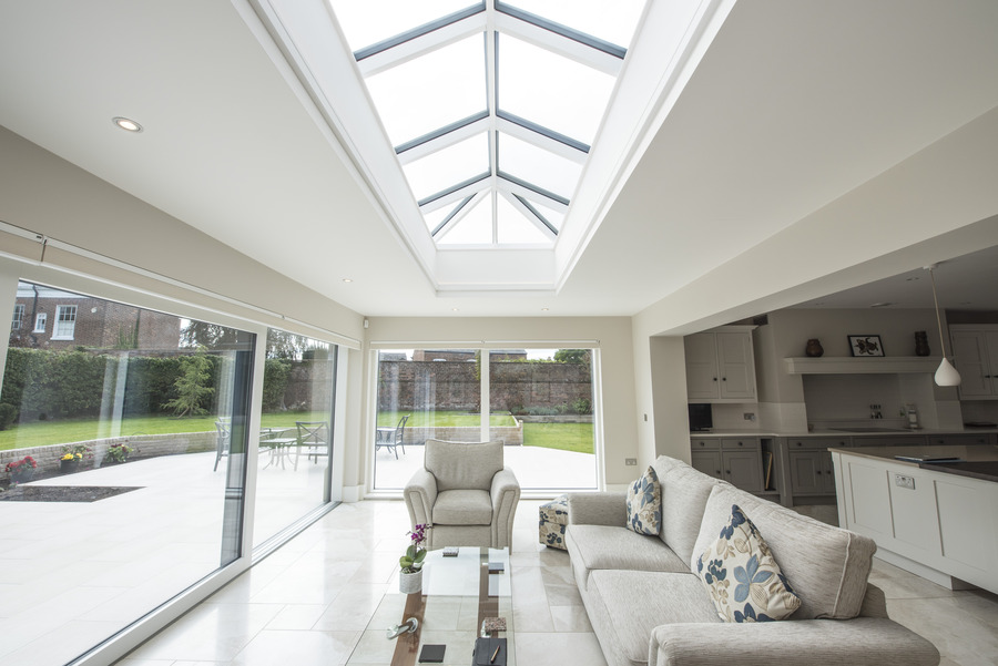 A modern and contemporary extension with sliding doors and a roof lantern.